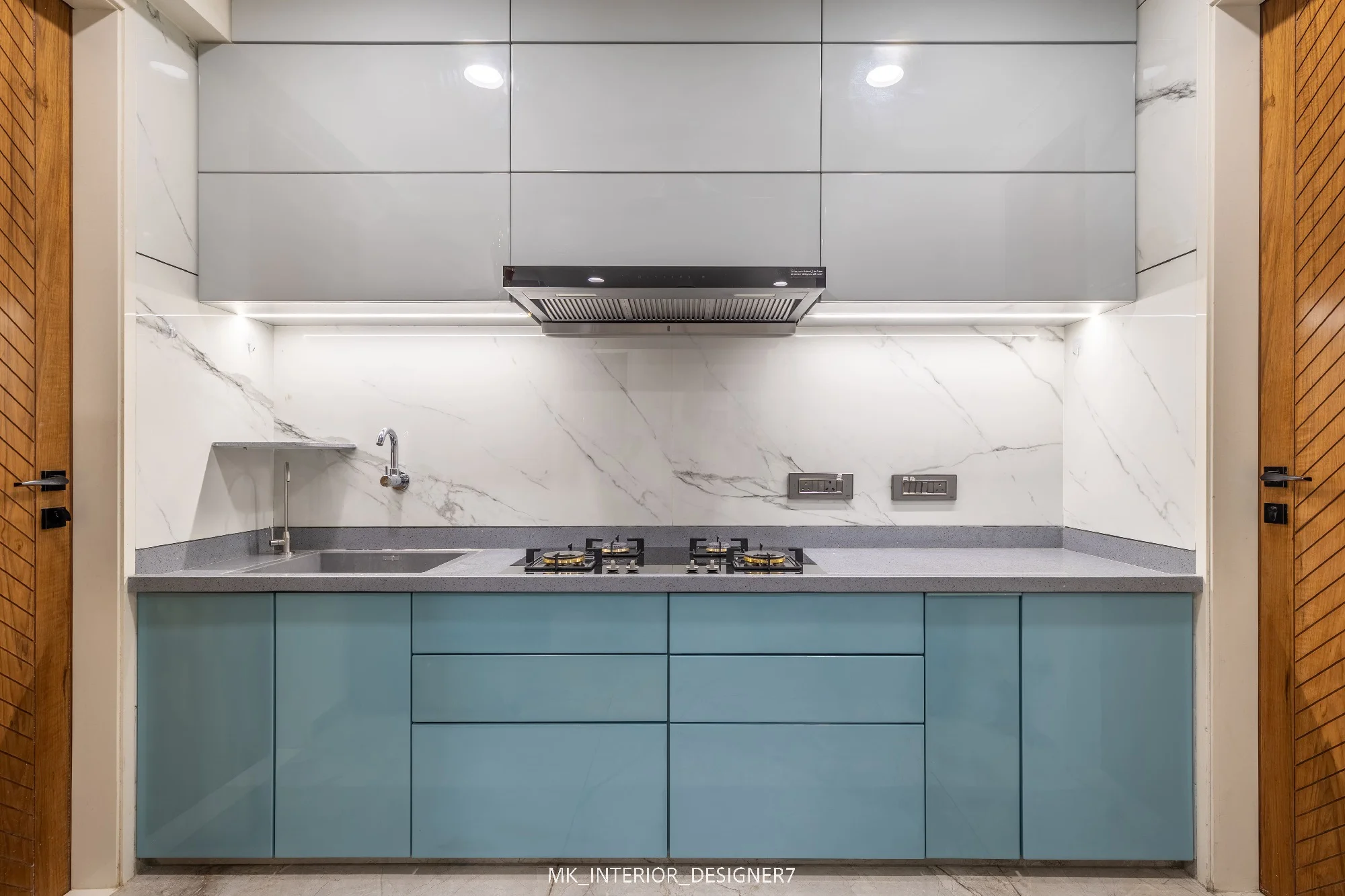 Modular kitchen design with light grey and blue shutters, Vadodara